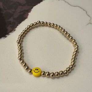 Gold Beaded Bracelet with Yellow Smiley Charm